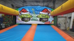 Slide1 1669409553 1 Knock the Grinches Teeth Inflatable