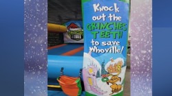 Slide1 1669409576 1 Knock the Grinches Teeth Inflatable